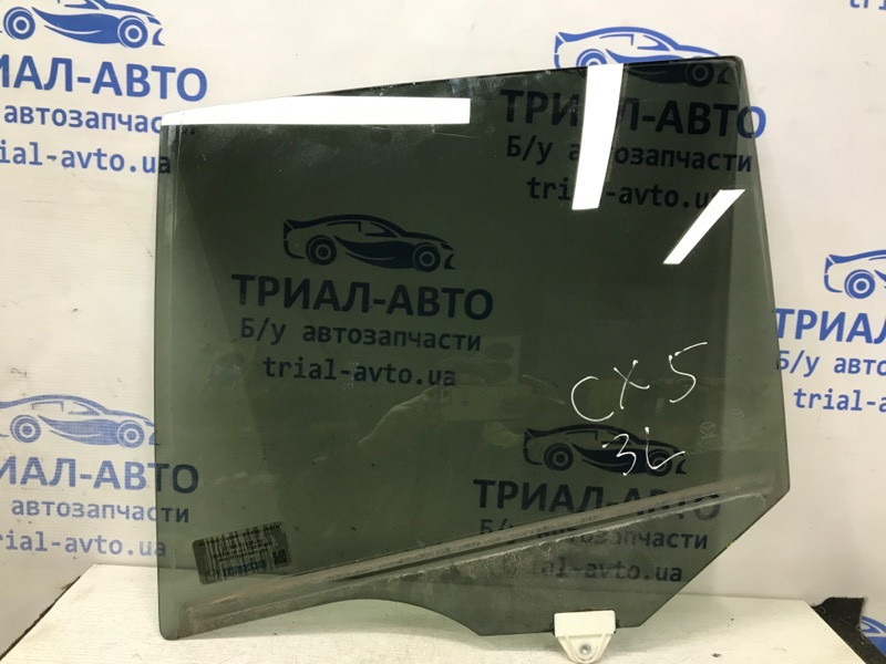 Стекло двери заднее левое Mazda CX 5 KE 2.2 DIESEL 2011 (б/у) Київ - зображення 1