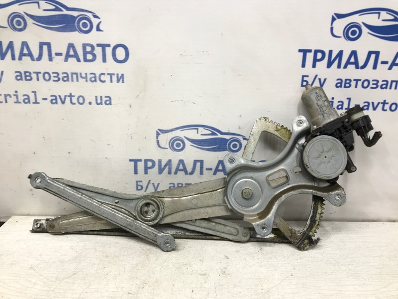 Стеклоподъемник задний левый Mitsubishi L200 KB 2.5 ДИЗЕЛЬ 4D56U 2006 задн. (б/у) Киев - изображение 1