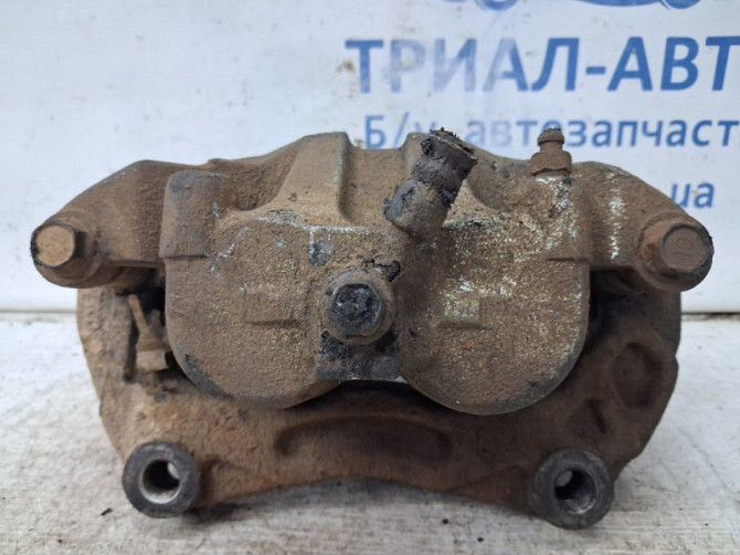 Суппорт передний левый Nissan Navara D40 2.5 DIESEL YD25DDTI 2004 (б/у) Киев - изображение 3