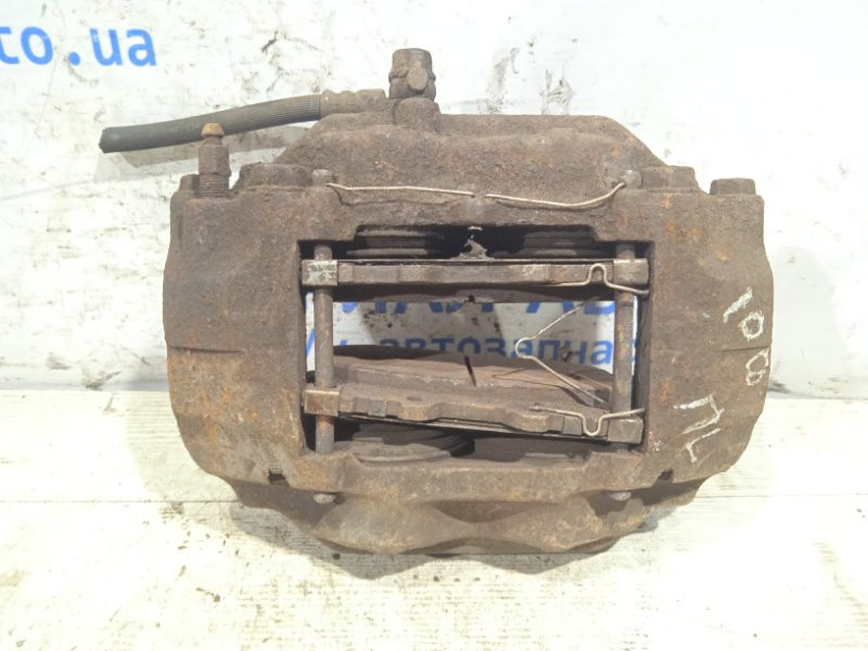 Суппорт передний левый Toyota Land Cruiser J100 1998 (б/у) Киев - изображение 1