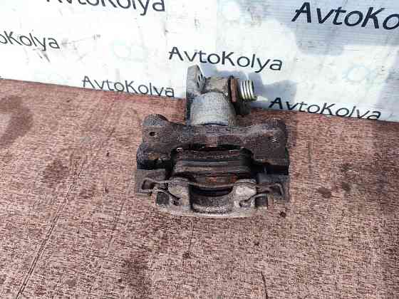 Суппорт задний левый Nissan Primera P12 2001-2007 Ковель