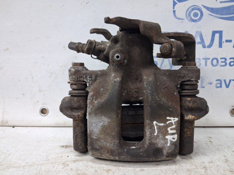 Суппорт задний левый Toyota Auris E150 1.6 БЕНЗИН 1ZRFAE 2006 (б/у) Київ - зображення 1