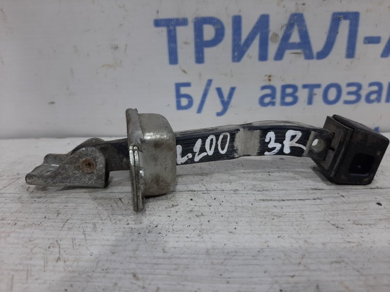 Ограничитель двери задний правый Mitsubishi L200 KB 2.5 ДИЗЕЛЬ 4D56U 2006 (б/у) Київ - зображення 1