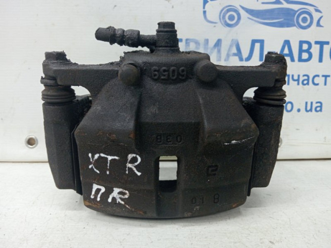 Суппорт передний правый Nissan X-Trail T31 2.0 DIESEL M9R 2007 (б/у) Київ - зображення 1