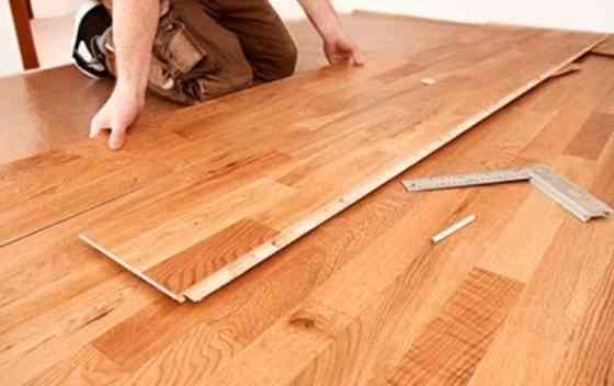 Настил ламината Поклейка обоев Київ