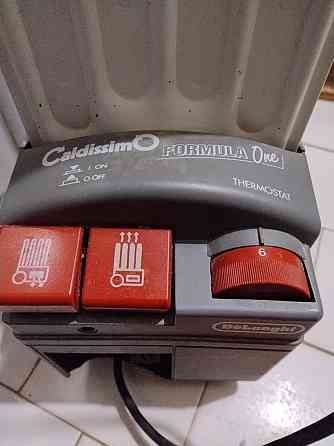 Масляный обогреватель Delonghi Дніпро