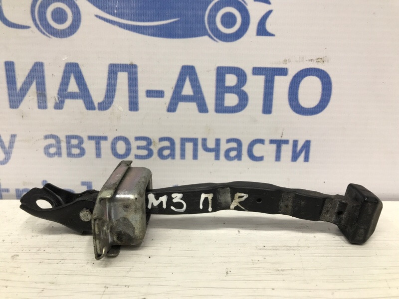 Ограничитель двери передний правый Mazda 3 BM 2.2 DIESEL 2013 (б/у) Киев - изображение 1