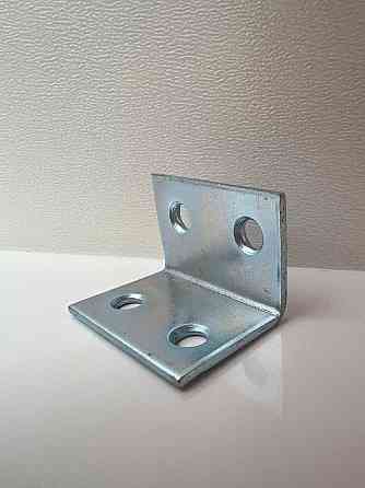 Куточок 20х20х30х1.5 кріпильний меблевий металевий Нововолынск