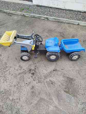 Продам дитячий педальний трактор Rolly Toys New Holland T7040 Київ