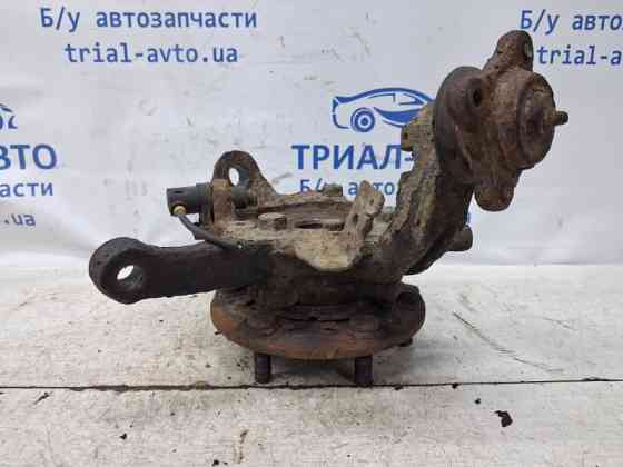 Кулак поворотный левый со ступицей Mitsubishi L200 KB 2.5 ДИЗЕЛЬ 4D56U 2006 (б/у) Київ