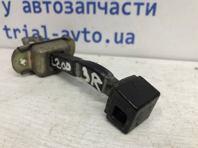 Ограничитель двери задний правый Mitsubishi L200 KB 2.5 ДИЗЕЛЬ 4D56U 2006 (б/у) Киев - изображение 3