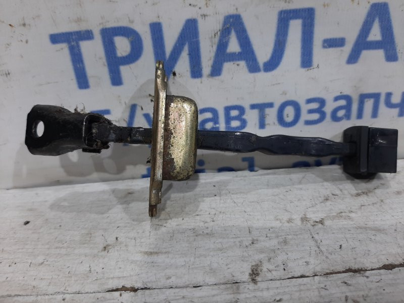 Ограничитель двери задний левый Mitsubishi Pajero Wagon 3 3.2 ДИЗЕЛЬ 4M41 1999 (б/у) Киев - изображение 2