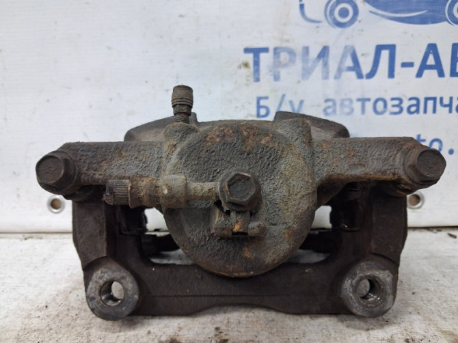 Суппорт передний левый Nissan Qashqai J10 2.0 БЕНЗИН MR20DE 2006 (б/у) Киев - изображение 3