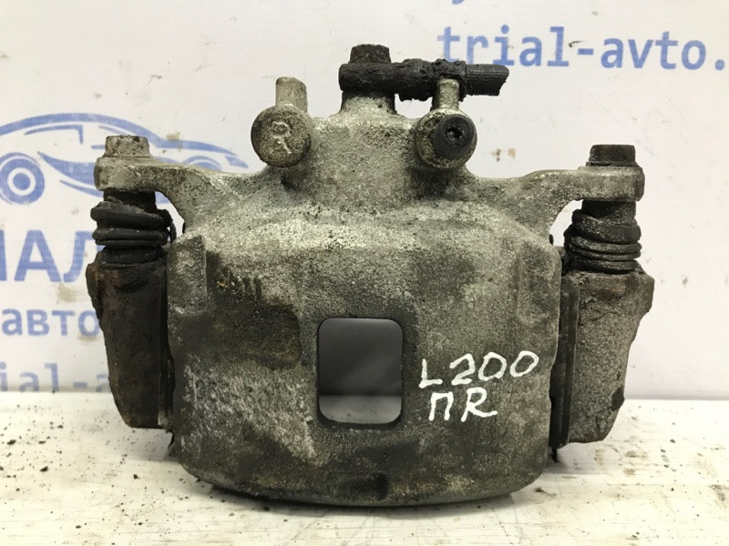 Суппорт передний правый Mitsubishi L200 KB 2.5 ДИЗЕЛЬ 4D56U 2006 (б/у) Київ - зображення 1