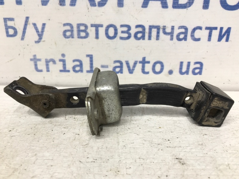 Ограничитель двери задний левый Mitsubishi L200 KB 2.5 ДИЗЕЛЬ 4D56U 2006 (б/у) Киев - изображение 1