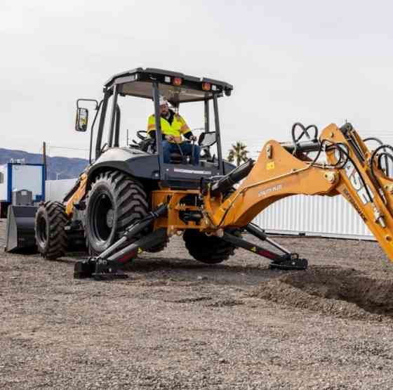 Готовая к работе спецтехника трактор, экскаватор, комбайн Дніпро